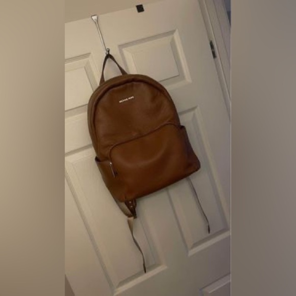 BEAUTIFUL tan leather Micheal Kors backpack purse! Only used a few times.